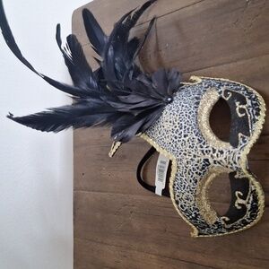 Elegant Black and Gold Masquerade Mask with Feathers
